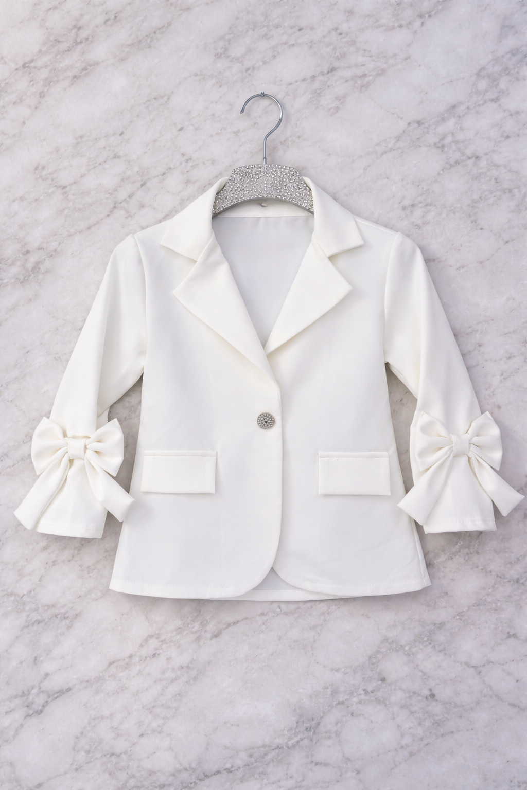 White bow blazer
