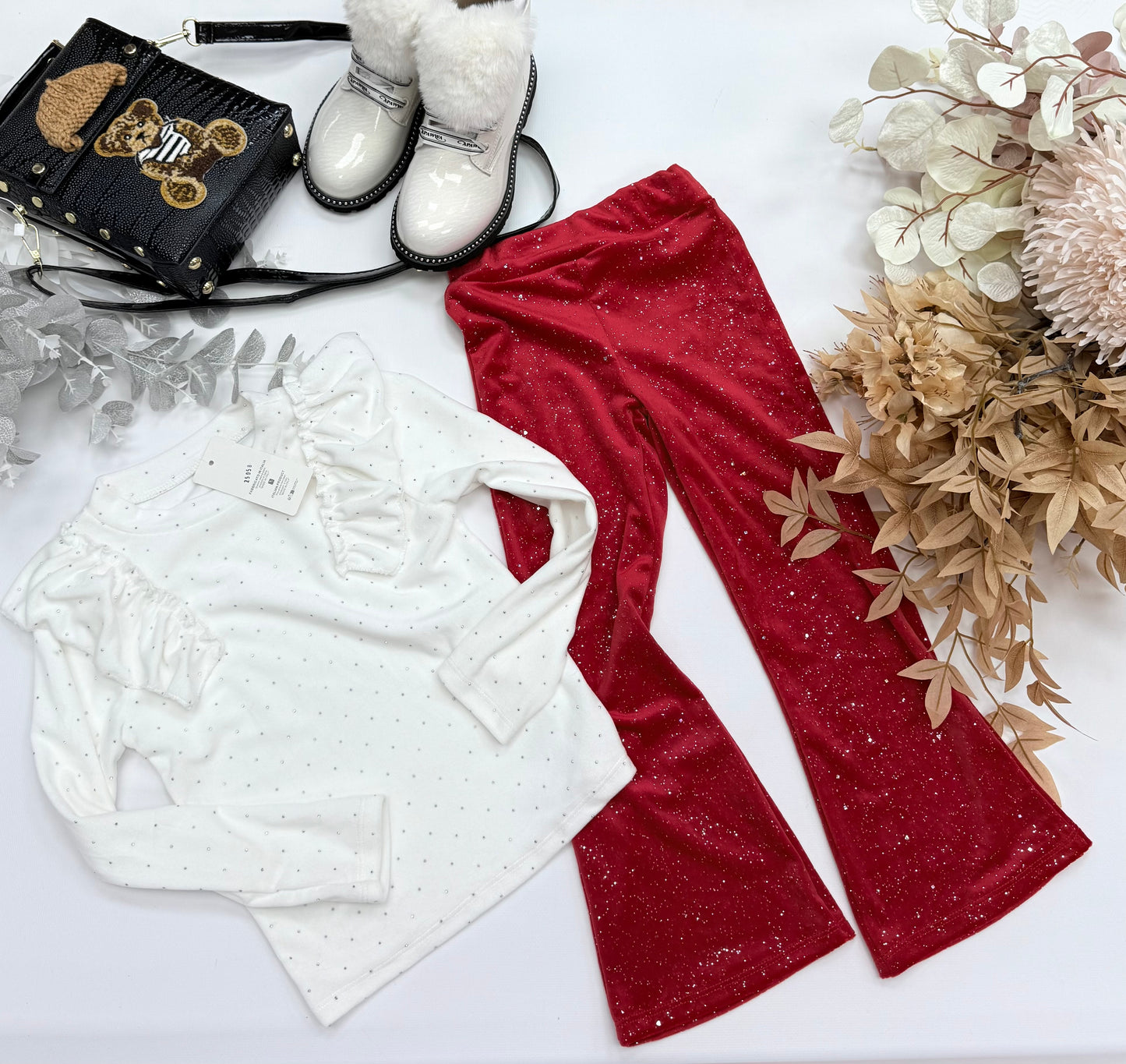 Red velvet flared pants