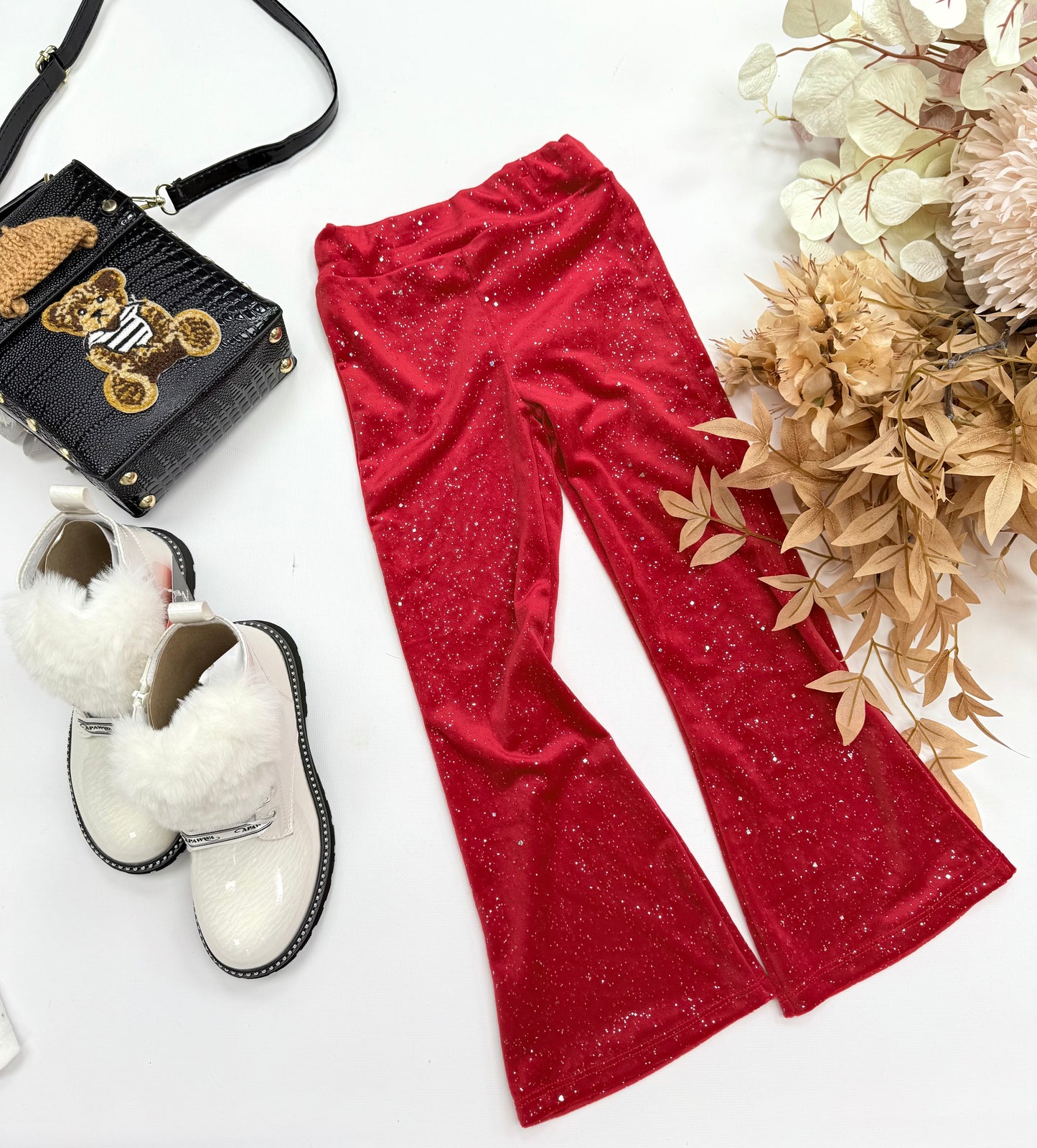 Red velvet flared pants