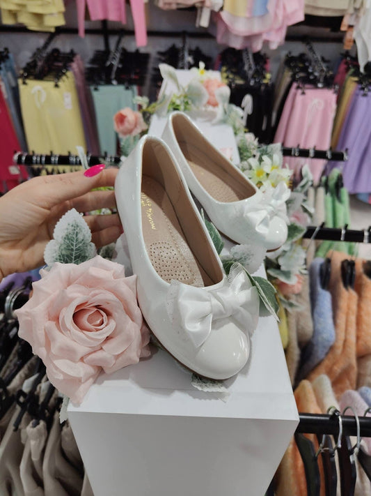 White ballerina with bow