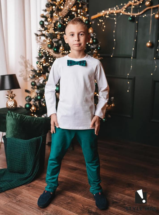 White top with green bow