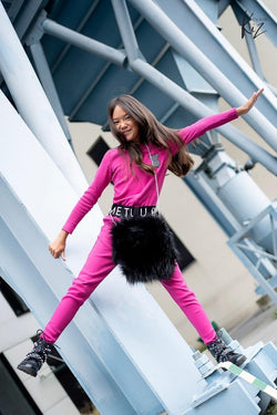 Pink playsuit with belt